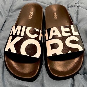 Black & white Michael Kors slides size 7